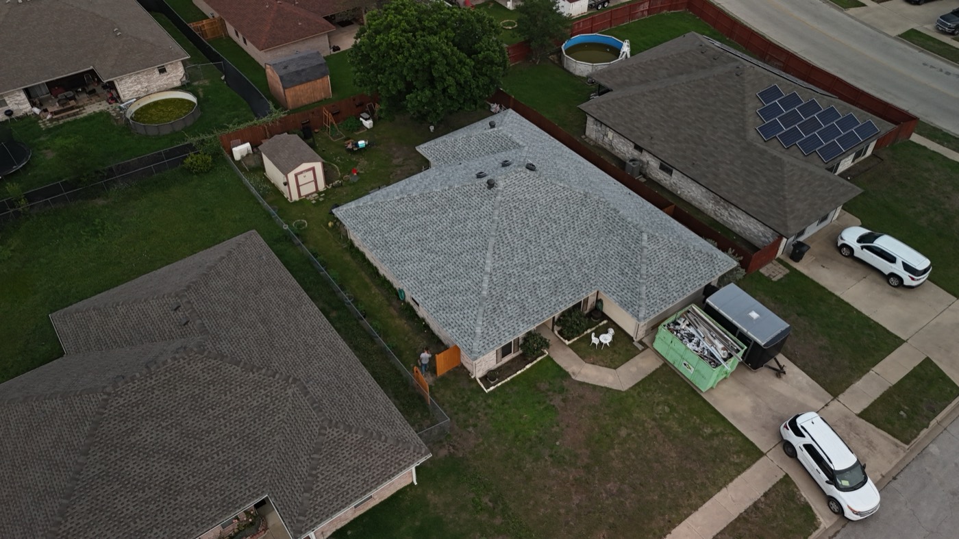 Aerial view of completed flat roof replacement in Round Rock, TX