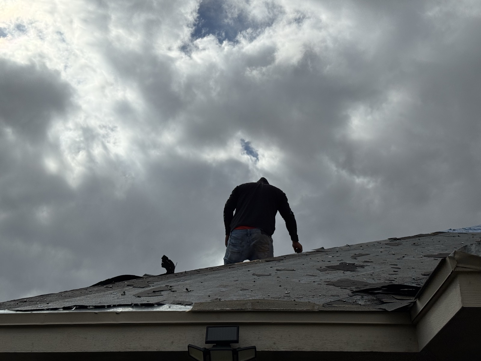 Attic inspection tracing a roof leak back to its entry point in Travis County, Texas